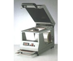 Packing machines for trays and cups
